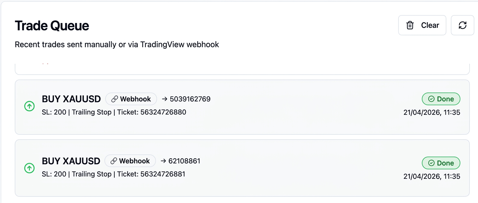 Trade Queue example showing two successful BUY XAUUSD trades from a TradingView webhook