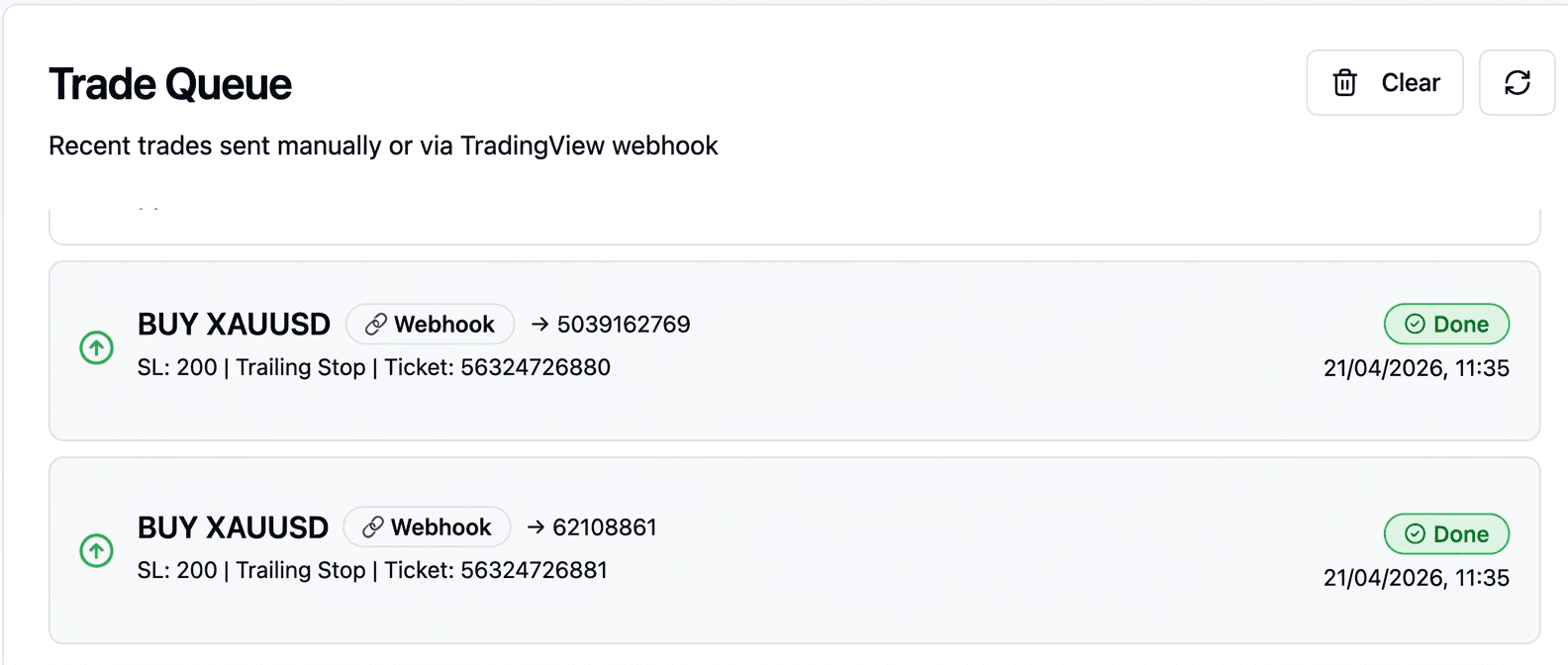 Trade Queue example showing two successful BUY XAUUSD trades from a TradingView webhook